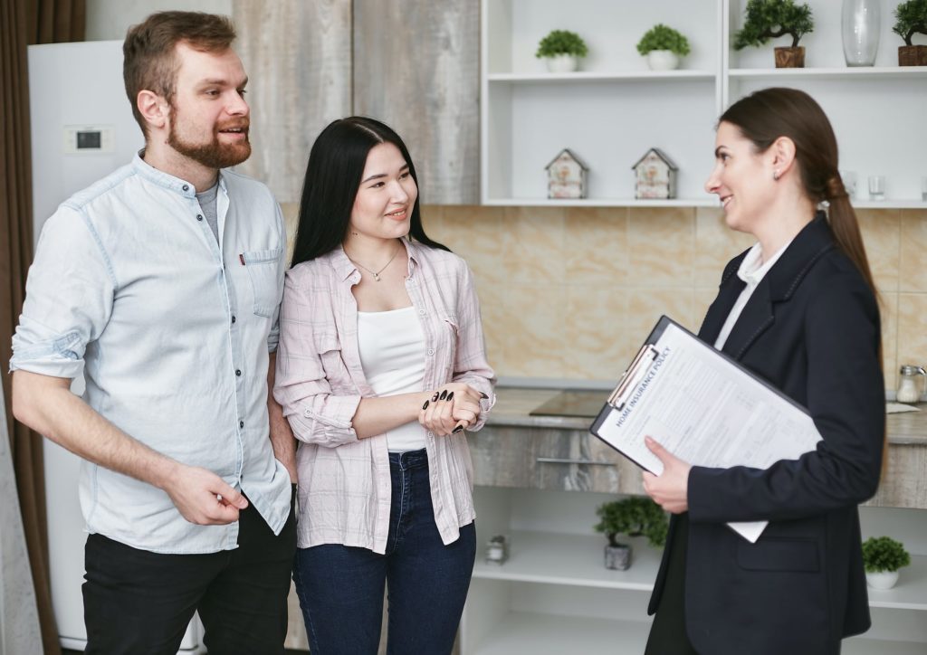 a group of people standing in a room