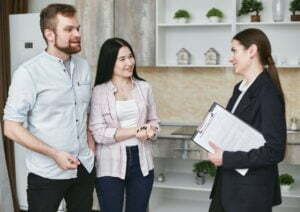 a group of people standing in a room