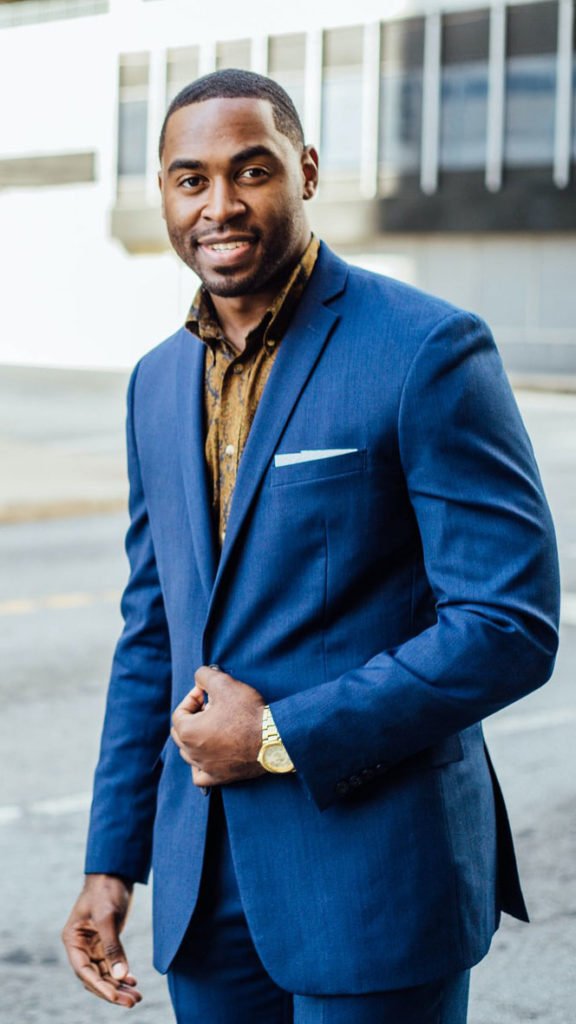 a man in a blue suit