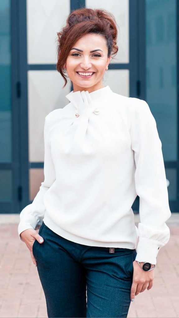 a person wearing a white coat
