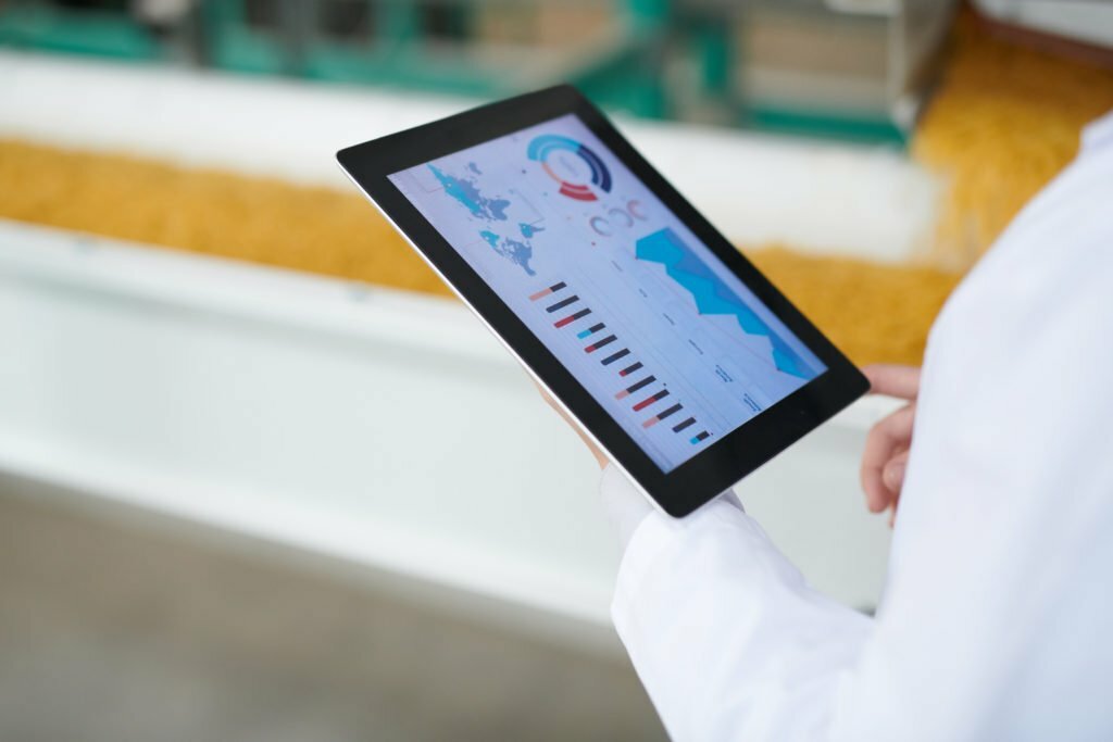 a person holding a tablet