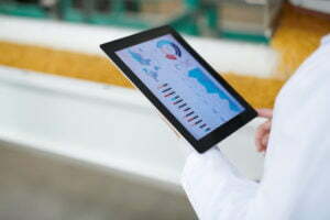a person holding a tablet