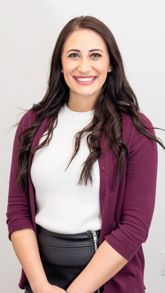 a woman smiling for the camera