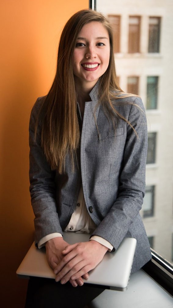a woman smiling at the camera