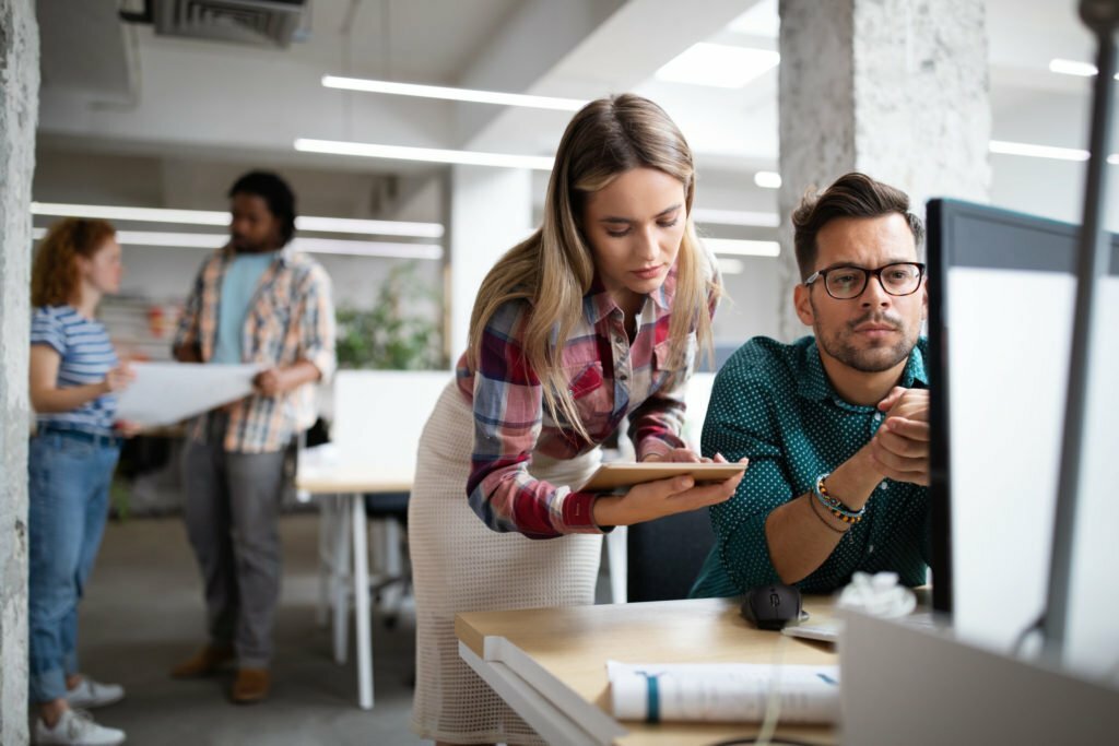 a group of people in an office