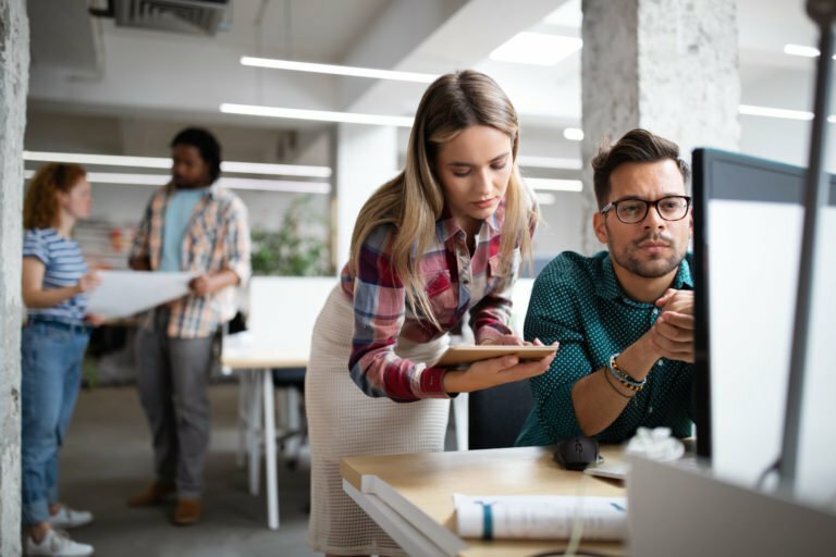 a group of people in an office