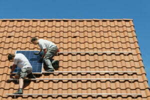 workers installing solar panel on roof framework o 2022 03 07 23 55 59 utc scaled