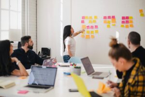 a group of people in a meeting